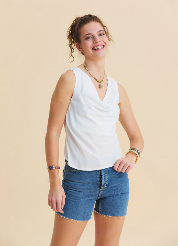 White Sleeveless Blouse with Open Collar, Cross Back, and V Neckline 4985