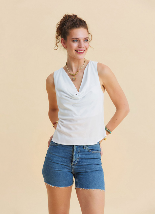 White Sleeveless Blouse with Open Collar, Cross Back, and V Neckline 4985